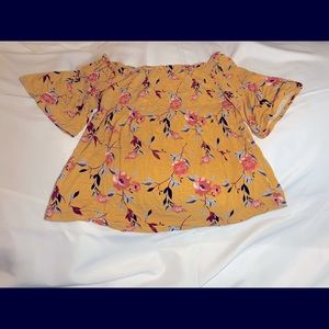 Mustard with multicolored flowers off shoulder top
